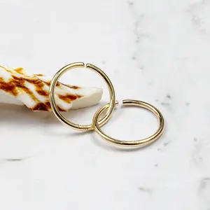 Anillo de oro sólido de 14KT sin costuras, anillo de aro flexible, piercing, joyería