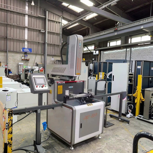 Machine de perçage et de fraisage CNC à double tête en alliage d'aluminium, machine intégrée pour la fabrication de fenêtres et de portes - Product Image 3