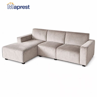 Canapé modulaire moderne en forme de L avec chaise longue gauche, assise profonde et accoudoirs larges, idéal pour salon, appartement, hôtel, villa