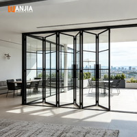 Portes pliantes en aluminium isolées thermiquement pour l'extérieur WANJIA, portes de patio pliantes avec revêtement en poudre