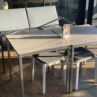 Table de salle à manger extérieure moderne DEBO, utilisation hôtelière, facile à nettoyer, compacte, plateau en stratifié HPL