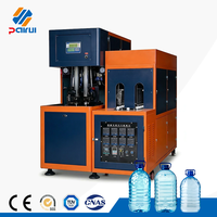 Machine de soufflage de plastique semi-automatique à succès – Machine de soufflage de bouteilles PET