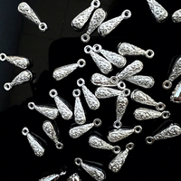 Perles entretoises en forme de fleur argentées brillantes en gros pour pendentifs et bijoux faits à la main