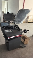 Équilibreuse de roues manuelle Aomai 200 tr/min avec écran LED, capacité 70 kg, alimentation 110V/220V, pour réparation automobile et alignement des pneus, garantie 1 an