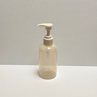 Flacon pompe rond en PET semi-transparent beige ambré de 200 ml (6 oz) pour sérum, huile nettoyante, lotion corporelle