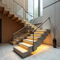 Escalier moderne en acier à double poutre avec marches en bois élégantes pour les intérieurs de maisons résidentielles
