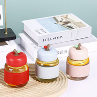 En stock – Tasse en verre de petite capacité, élégante mini-tasse à lait de soja avec couvercle hermétique, style moderne et minimaliste (motif pomme)