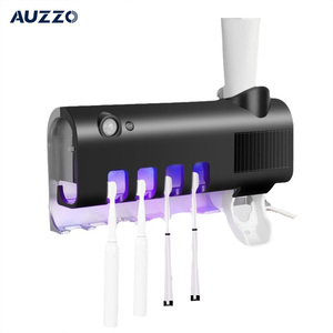 Soporte de pared inteligente para cepillos de dientes con esterilizador UV, dispensador automático de pasta de dientes sin perforaciones, organizador de baño para uso familiar - Product Image 3