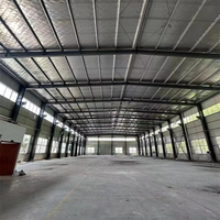 Entrepôt/Atelier en structure acier sur mesure certifié, robuste, avec mezzanine et escalier de haute qualité