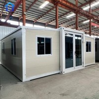 Villa préfabriquée de luxe à double aile extensible, en conteneur, avec structure en acier, panneaux de bardage étanches, climatisation personnalisée pour hôtel et appartement