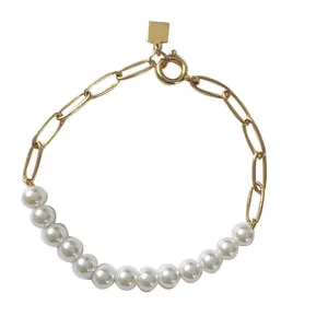 Hot trendy jewelry fashion half pearls half paperclip chain pearl gold chain bracelet supplier