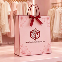 Sacs en papier kraft personnalisés avec logo, usine source, sacs d'emballage pour vêtements, sacs de courses, nœud rose classique et luxueux