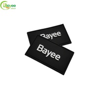 Écussons 3D souples personnalisés en silicone, PVC, caoutchouc, logo caoutchouté, badges thermocollants pour vêtements et chapeaux