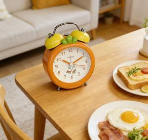 <span class=keywords><strong>Orologio</strong></span> da Tavolo in Plastica a Forma di Campana con Motivo Arancione per Bambini - Product Image 1