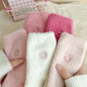 Wholesale Pink Smiley Soft Warm custom embroidered cozy Plush winter fluffy socks For Women