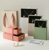 Boîte à bijoux écologique imperméable avec poignée perlée et tiroir coulissant pour ranger bagues, boucles d'oreilles et montres, rigide