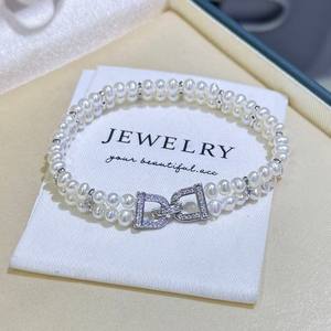 Brazalete Doble Hecho a Mano con Doble Botón en D, Perlas de Agua Dulce de Alta Calidad, Casi Redondas, Elegantes - Product Image 1