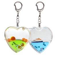 Porte-clés en plastique en forme de cœur rose, bleu, vert, rempli de liquide, avec flotteur en résine en forme de bateau et confettis scintillants à l'intérieur, idéal pour les cadeaux