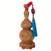 Sculpture artisanale en bois de calebasse symbolisant la chance, l'harmonie et la prospérité pour une décoration élégante de la maison et du bureau