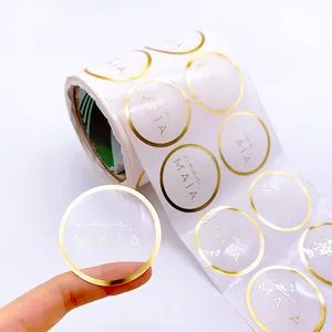 Rouleau d'étiquettes d'emballage avec logo adhésif transparent en feuille d'or rose imprimé rond personnalisé