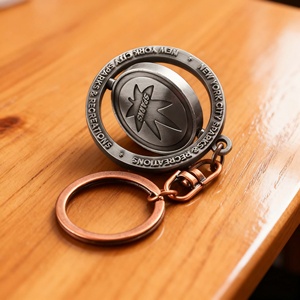 พวงกุญแจหมุนได้แบบสั่งทำจากโรงงาน รูปทรงกลม สีทอง สีเงิน ประดับด้วยเคลือบเงา ของที่ระลึกทางศาสนา - Product Image 5