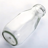 Vente en gros de bouteilles en verre vides pour le lait, le jus, le café, le thé, les boissons énergisantes, les boissons gazeuses avec couvercles métalliques
