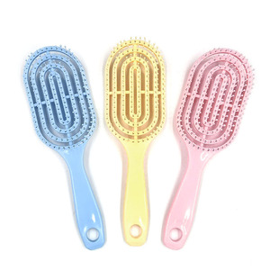 This is a bouncy, high-top hair <b>comb</b> for young women, a massage <b>comb</b> for home use, a large curved <b>comb</b> with a hollowed-out arc - Product Image 2