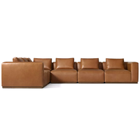 Canapé modulaire en cuir de haute qualité avec assise cascade et coussins rembourrés, idéal pour hôtel et salon