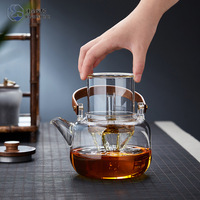 Bouilloire à vapeur personnalisée tout-en-un théière pour Noël Design moderne Ensemble de théière en borosilicate Infuseur en verre Caractéristiques d'utilisation manuelle