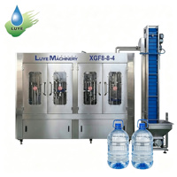 Machine de lavage, remplissage et bouchage rotative 3 en 1 pour bouteilles PET de 15 L, 800 BPH