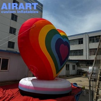Accessoires de décoration de couleur sur mesure coeur de couleur arc-en-ciel gonflable, ballon de modèle gonflable énorme coeur pour la Saint-Valentin