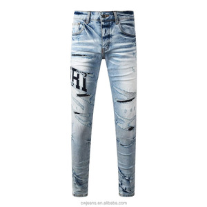 Jeans pour hommes de haute qualité de style punk de rue, jeans <span class=keywords><strong>skinny</strong></span> déchirés <span class=keywords><strong>et</strong></span> rapiécés, jeans <span class=keywords><strong>skinny</strong></span> coupe ajustée au design à la mode - Product Image 1