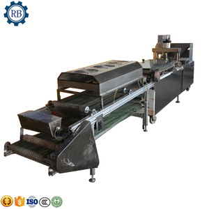 Machine à pain arabe pour pain plat doux Machine à crêpes rotative Machine à fabriquer des céréales - Product Image 1