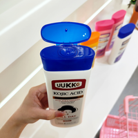 UUKKG Vente en gros 400ml Lotion corporelle éclaircissante et hydratante biologique à marque privée, enrichie en Vitamine C, Curcuma, Acide Kojique et Arbutine