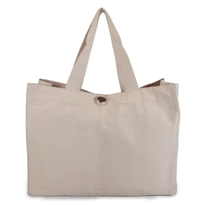 Large canvas tote shopping bag with leather pockets and handles