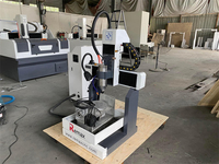 Machine de fraisage CNC 5 axes facile à utiliser, système de contrôle Mach3 NC Studio, broche simple 2,2 kW, refroidissement par eau pour le métal