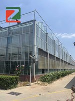 Serre à grande échelle de marque Zhuotai avec structure en fibre de verre et bâche en film pour l'agriculture intelligente, culture de tomates et de piments, origine Chine