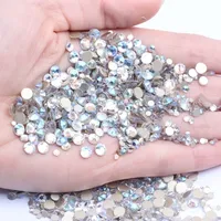 Prix d'usine Strass en verre en vrac, cristal, accessoire de décoration pour vêtements, non thermocollant, à dos plat, phosphorescent pour le nail art
