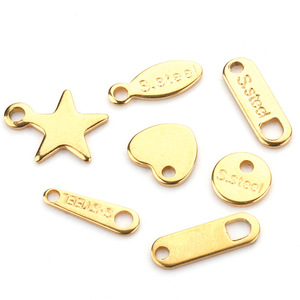 Etiquetas de acero inoxidable chapadas en oro de diferentes formas para la fabricación de pulseras, grabado de logotipos, accesorios de joyería - Product Image 1