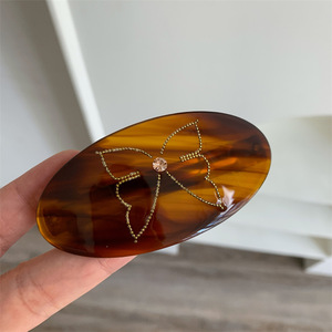 DOWELL Clip à ressort papillon ovale géométrique au design créatif unique et de niche, adapté aux coiffures mi-hautes à l'arrière de la tête - Product Image 3