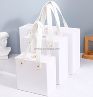 Nouvelles boîtes cadeaux de luxe rigides carrées pour cadres photo 2025 avec poignée, en matériaux recyclés, finition mate, logo personnalisé, impression CMJN sur mesure