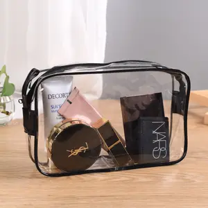 Vente en gros Pochette transparente en plastique PVC étanche pour femme Logo personnalisé de voyage Sac cosmétique transparent en PVC pour voyage