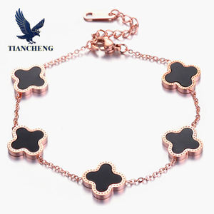 Ensemble de bijoux en or plaqué 18 carats de 15 mm avec trèfle à quatre feuilles, bracelet porte-bonheur tendance - Product Image 1