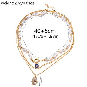 Collar de diamantes de aleación multicapa creativo al por mayor para mujer nuevo colgante de moda con <span class=keywords><strong>ojos</strong></span> de perla y cadena fina - Product Image 6