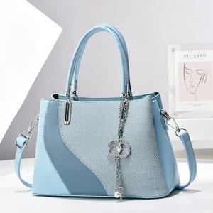 Bolso de mano de cuero con cadena de lujo para <span class=keywords><strong>mujer</strong></span>, novedad de 2025, estilo moderno, bolso de mano, forro de PU, precio de salida, venta al por mayor - Product Image 2