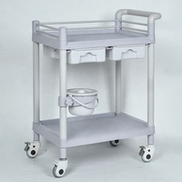 Chariot à instruments stable à 3 couches en plastique ABS de bonne qualité Panier à tiroirs Roues mobiles Table d'instruments médicaux Salon de beauté