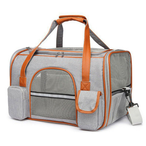 Sac de transport respirant en maille pour chat et chien, compatible avec les sièges de voiture, avec bandes réfléchissantes et poches avant - Product Image 1