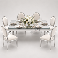 Table de salle à manger rectangulaire haut de gamme en acier inoxydable avec plateau miroir et pieds ronds effilés pour événements et banquets (vente en gros)
