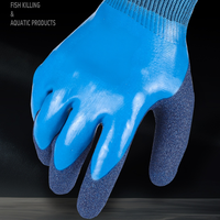 Gants en latex bleu de longueur poignet avec revers en tricot côtelé élastique, paume enduite imperméable et antidérapante pour usage industriel