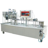 Machine de remplissage et de scellage de tasses à porridge produite par un fabricant professionnel